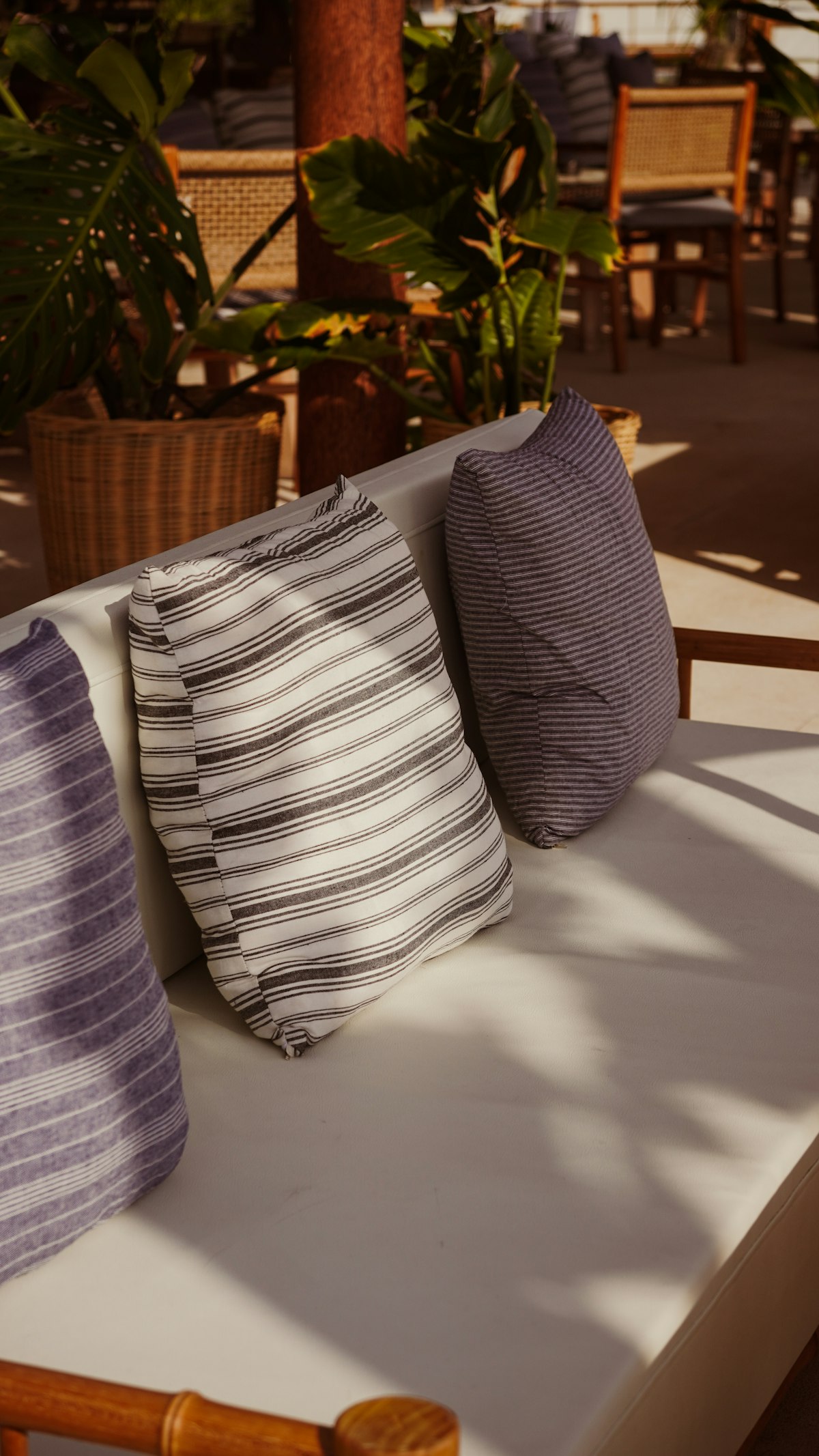 A sand and chalk striped outdoor cushion